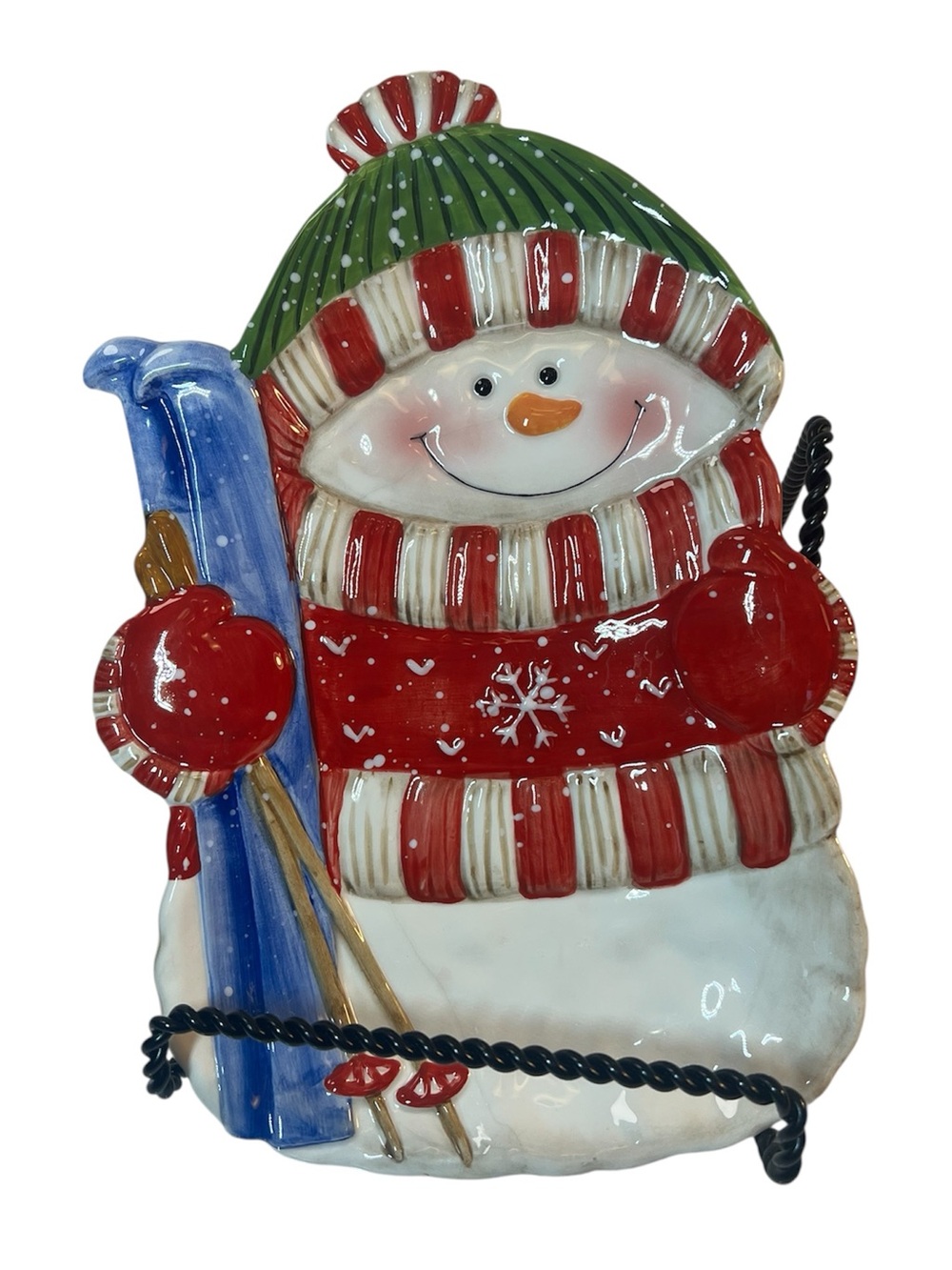 Festive Ceramic Plate Featuring a Snowman Skier Wearing Red & Green Clothing.